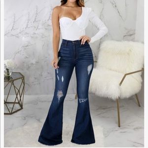Ripped Bell Bottom Jeans